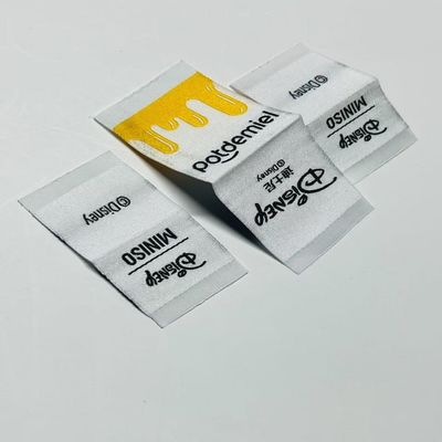 Kleideretiketten Kleideretiketten 0,4 mm Logo 5000 Stück